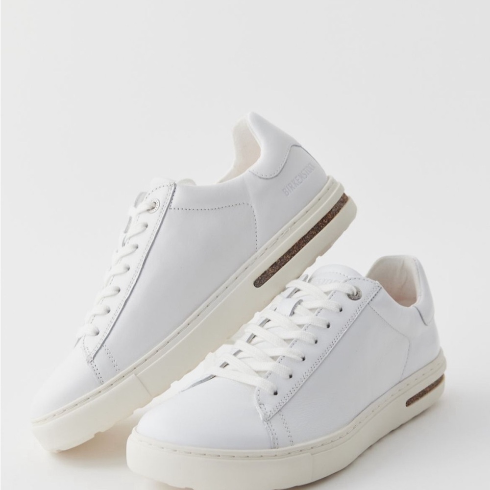 White Low-Top Sneakers with Textured Fabric and Metal Eyelets